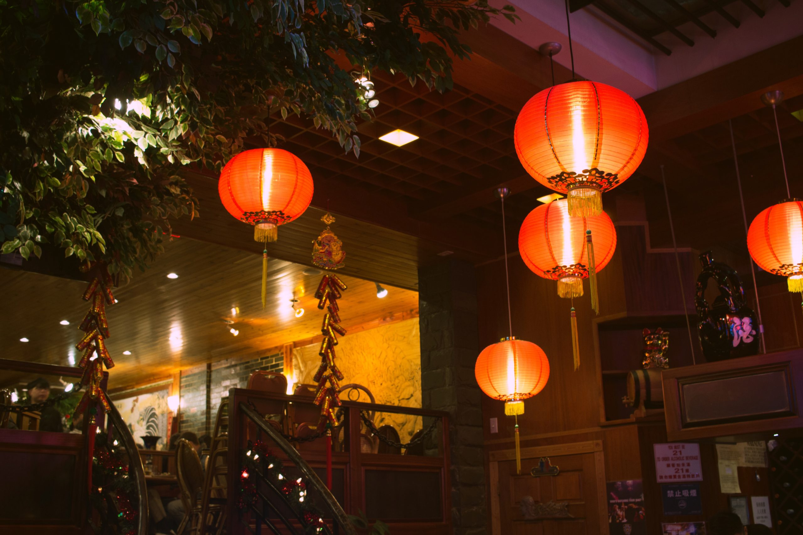 orange chinese lanterns in a restaurant 