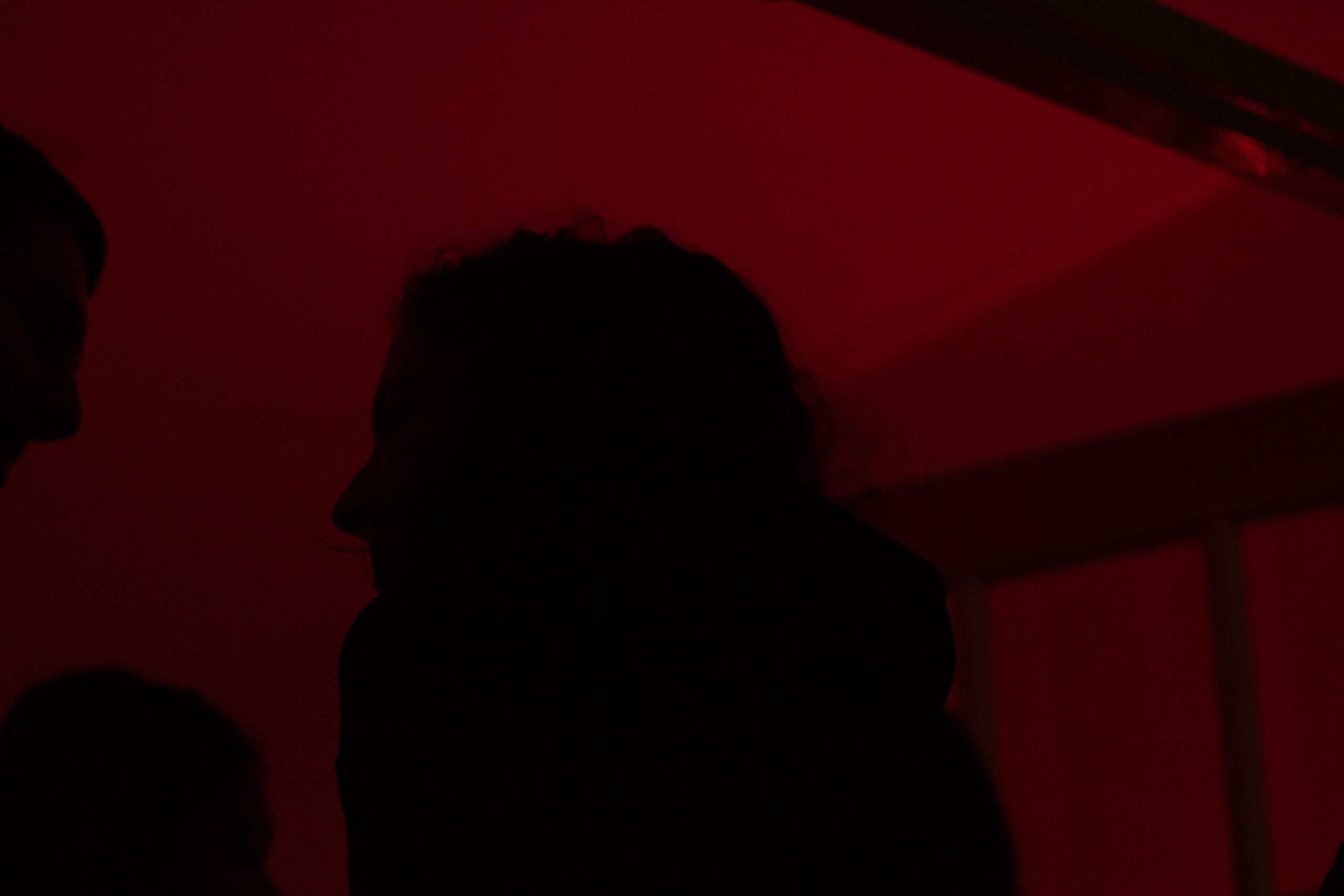 red light silhouette of a woman